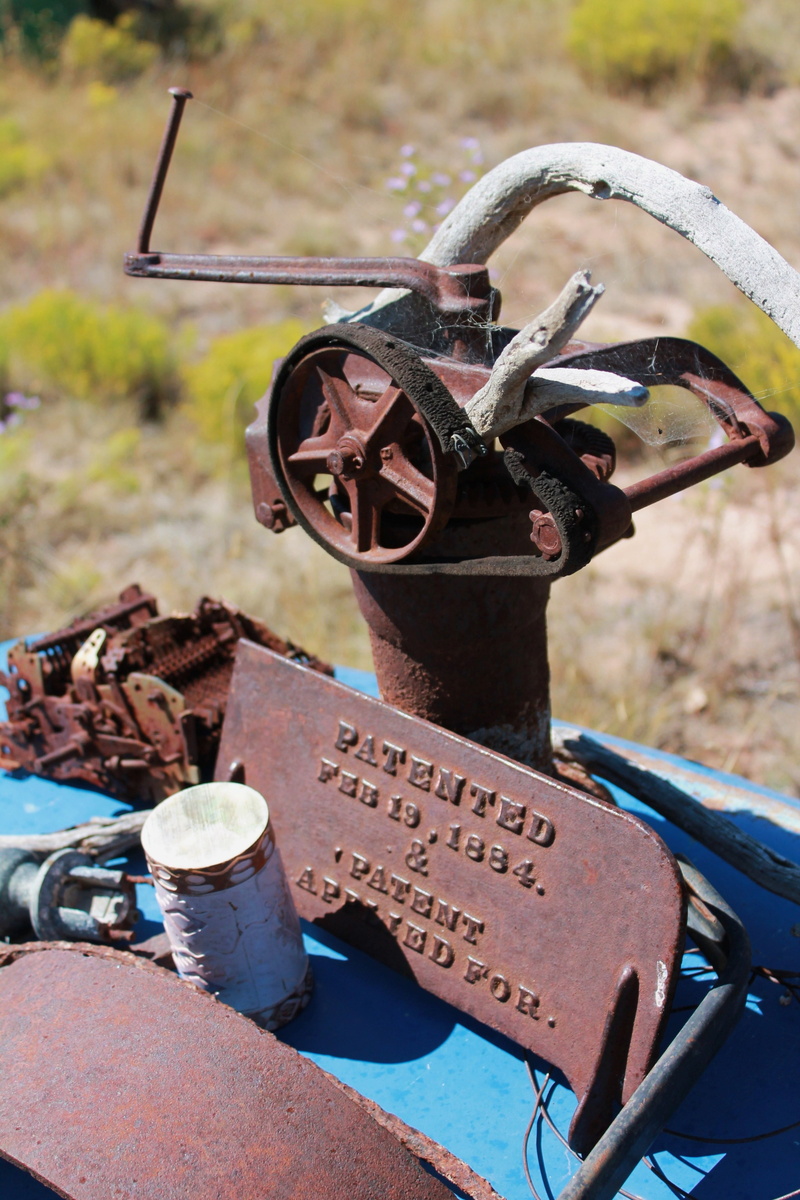 metal, santa fe, patent, outdoor art, lever, repurpose, control, outdoors, xeriscaping, focus on foreground, close-up, rust, transportation, xeriscape