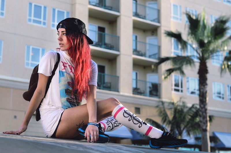young adult, one person, city, tattoo, real people, redhead, dyed hair, building exterior, baseball caps, young women, built structure, architecture, fashion