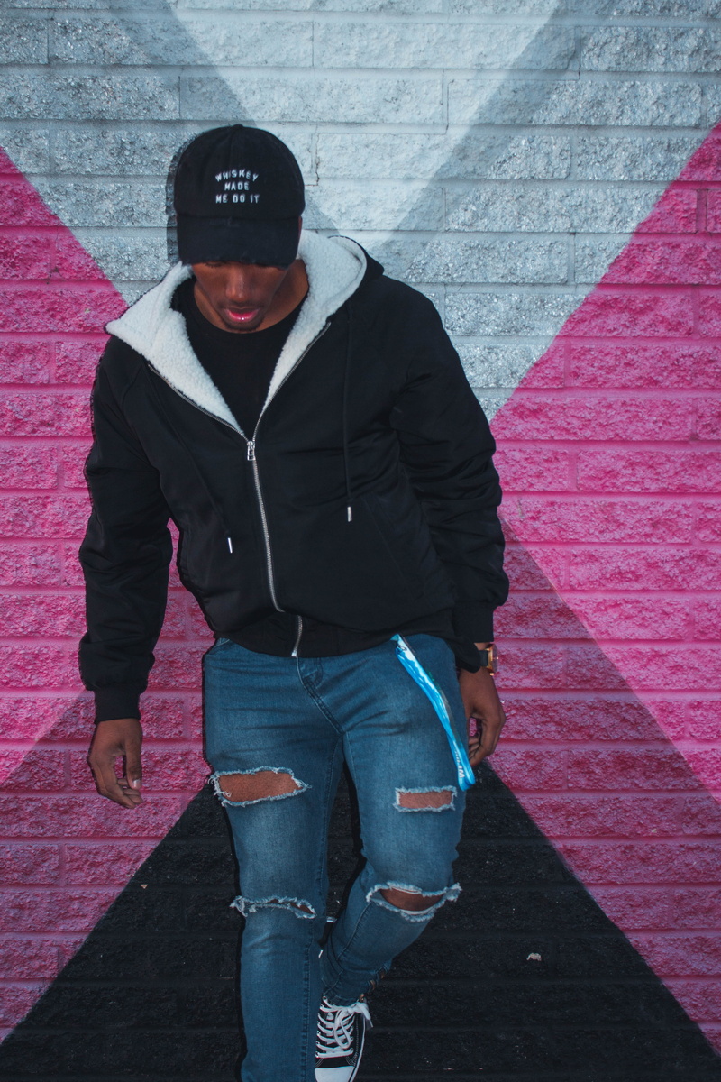 casual clothing, outerwear, casual, legs, one person, photoshoot, person, jacket, cap, white, outfit, looking at camera, focus, daylight, male model, jeans