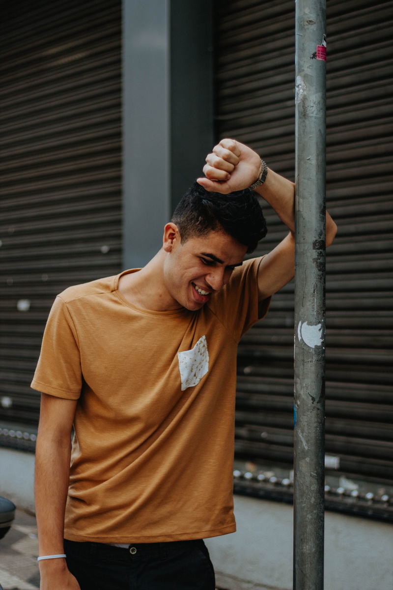5K, shutter, style, guy, orange, casual, men, outdoors, front view, architecture, iron, smile, three quarter length, young adult, portrait, young men