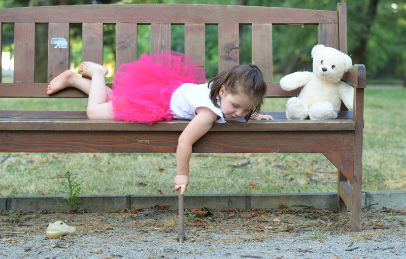 real people, Girl, portrait, one person, Child, Cute, person, bear, children only, outdoor, near, stick, lifestyles, day, holding, kid, childhood, lying