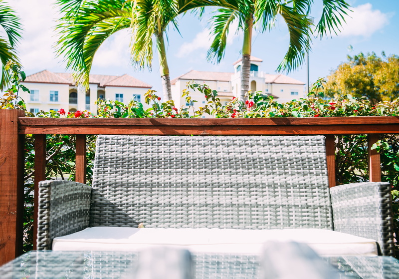 tiled floor, house, tourist resort, tree, building, couch, building exterior, day, religion, belief, luxury, garden, palm tree, tropical climate, architecture