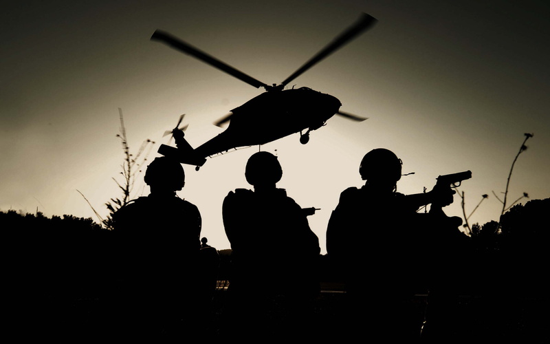 soldiers, friendship, silhouette, medium group of people, night., helicopter, group, sunset, togetherness, black hawk, transportation, outdoors, THE MH-60K
