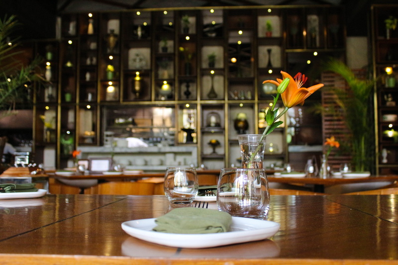 vulnerability, dinnerware, vase, table, pub, inside, no people, flower head, orange, hotel, clear, wooden, room, close-up, plant, nature, freshness, flower