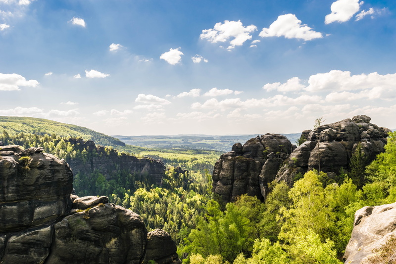 nature, surrounded, no people, beauty in nature, rock formation, gorges, tranquil scene, sky, rock - object, green, landscape, daytime, cliff, saxon switzerland