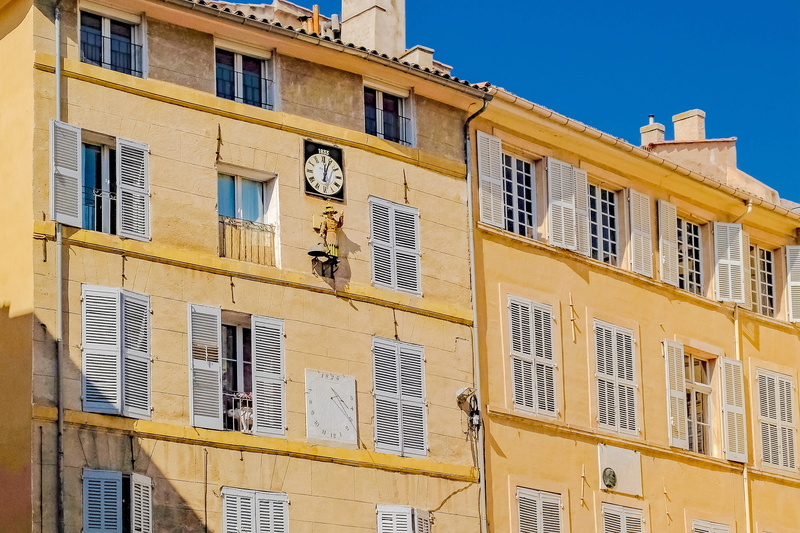 facade, europe, architecture, sundial, tourism, city, building exterior, blue, sky, house, day, clear sky, sunlight, no people, old, colorful, outdoors