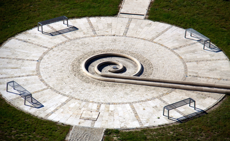 space, shape, bench, built structure, no people, sundial, building, circle, flagstone, veszprem, hungary, geometric shape, day, design, spiral, pattern