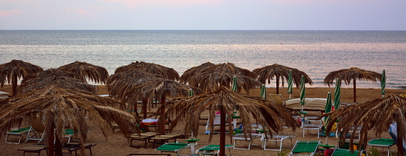 beauty in nature, no people, gargano, puglia, thatched roof, nature, tourism, beach, sand, 5K, umbrellas, scenics - nature, horizon over water, holidays