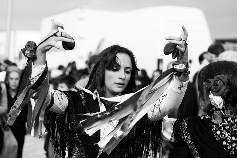holding, young adult, looking at camera, castañuelas, real people, front view, folklore, women, hairstyle, one person, focus on foreground, spain, palillos
