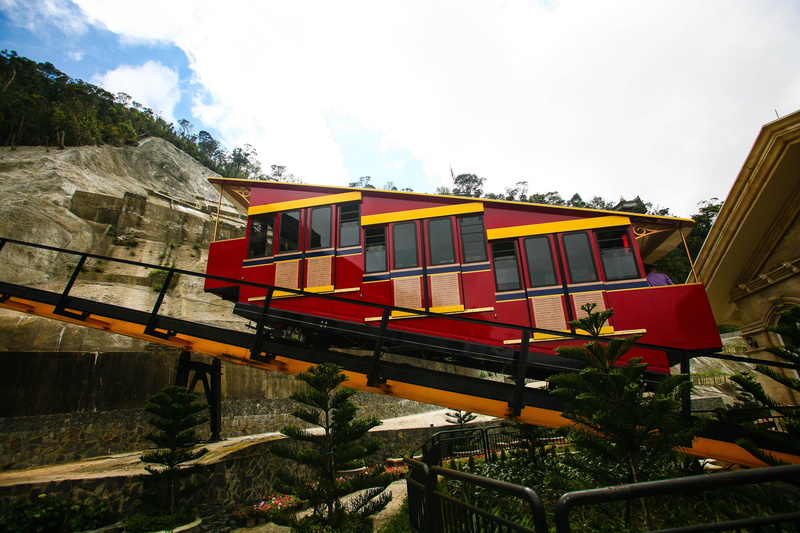 multi colored, built structure, hanging, mode of transportation, building, day, water, no people, nature, railroad Track, Train, architecture, cloud - sky
