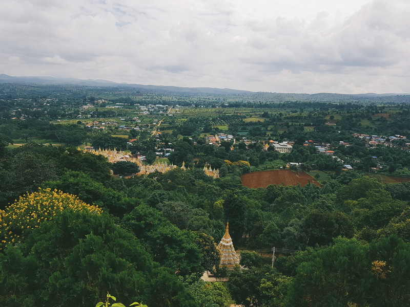 building exterior, beauty in nature, growth, green color, built structure, nature, plant, myanmar (burma), no people, shwe oo min pagoda st, high angle view