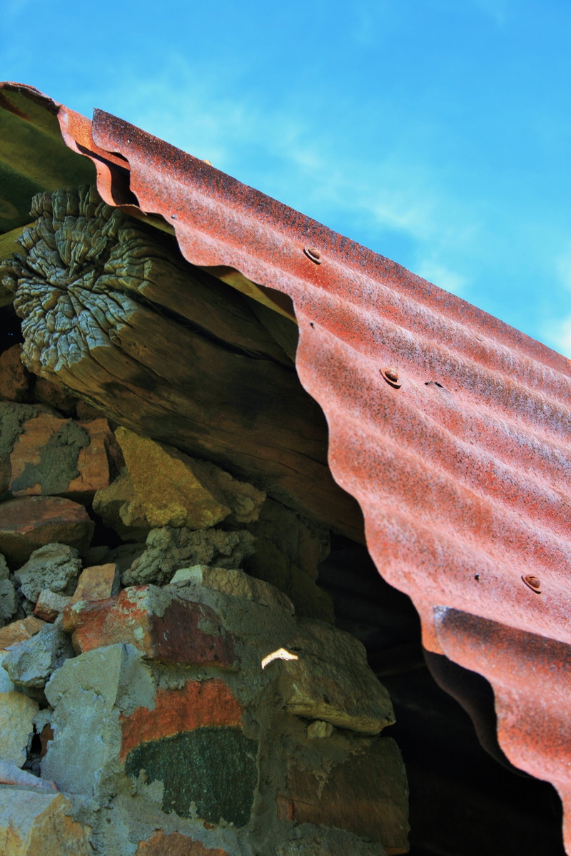 focus on foreground, red, outdoors, low angle view, nature, rusted, eroded, sky, willem prinsloo, plates, crumbling, solid, agriculture farm, building