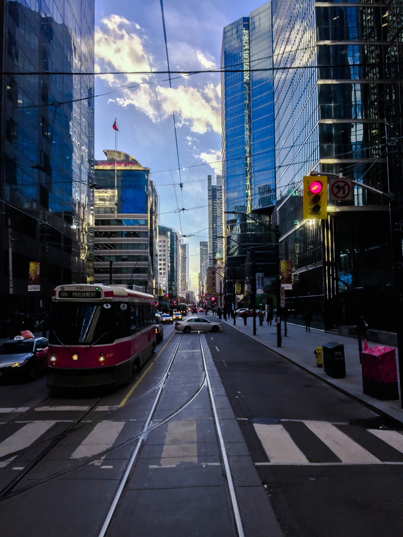 cloud - sky, city, day, 2K, outdoors, train, city street, the way forward, cars, 6ix, street, symbol, building exterior, tracks, 6, built structure, skyscraper