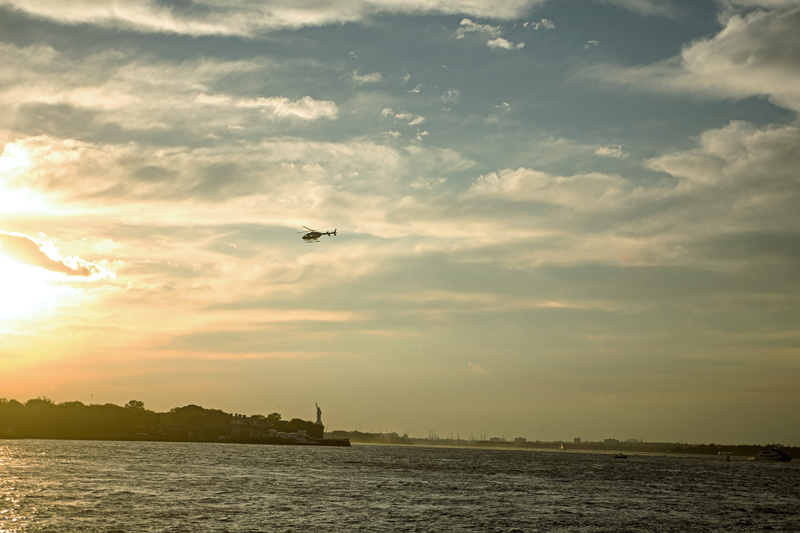 airplane, water, sunrise, animal wildlife, transportation, sunray, no people, bird, air vehicle, day, mode of transportation, winter, cloudscape, united states