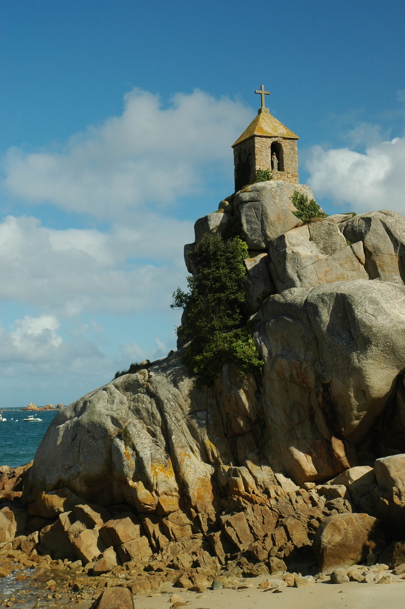 building, outdoors, fortress, rock, building exterior, day, rocky coast, beach, architecture, spirituality, english channel, cloud - sky, religion, rock - object