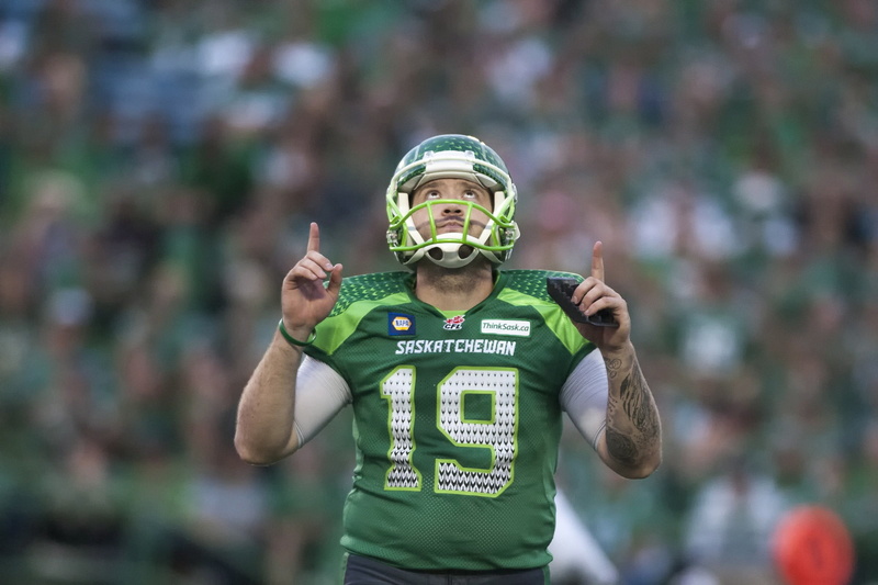 teenager, men, sport, portrait, one person, standing, saskatchewan roughriders, number, young men, waist up, protection, american football, outdoors, teenage boys