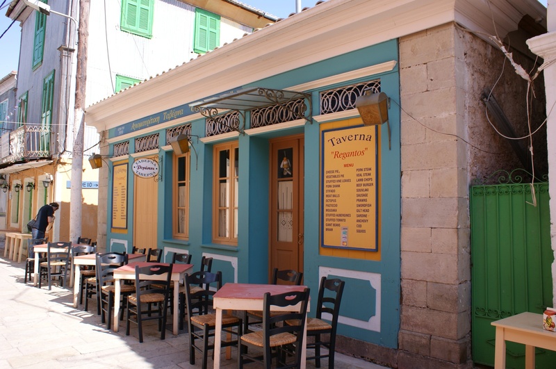 1080P, built structure, chair, greece, building, business, city, day, outdoors, sign, tavern, architecture design, tourism, table, lefkada, text, architecture
