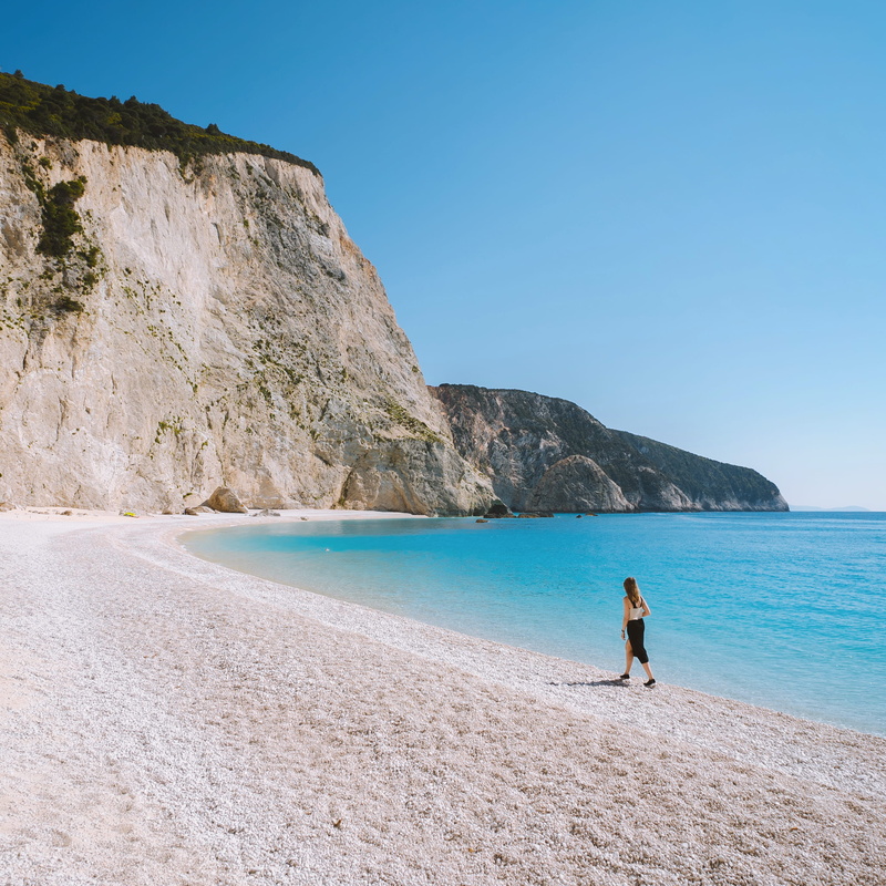 non-urban scene, one person, day, shoreline, nature, sky, gravel, tranquil scene, promontory, rock - object, person, human, island, scenery, 2K, cliff