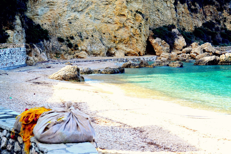 tranquil scene, tranquility, beach, paradise, transportation, rock - object, scenics - nature, sunlight, sand, beauty in nature, land, day, no people, rock formation