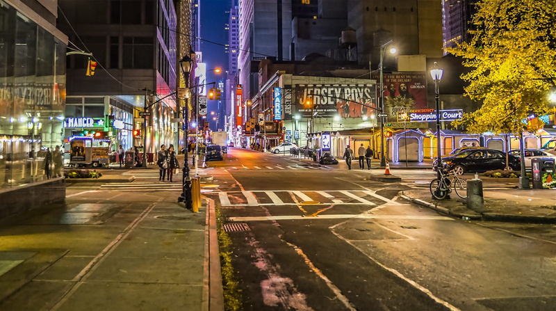 built structure, outdoors, transportation, building exterior, symbol, land vehicle, asphalt, sign, 8th avenue, new york, road, incidental people, hells kitchen