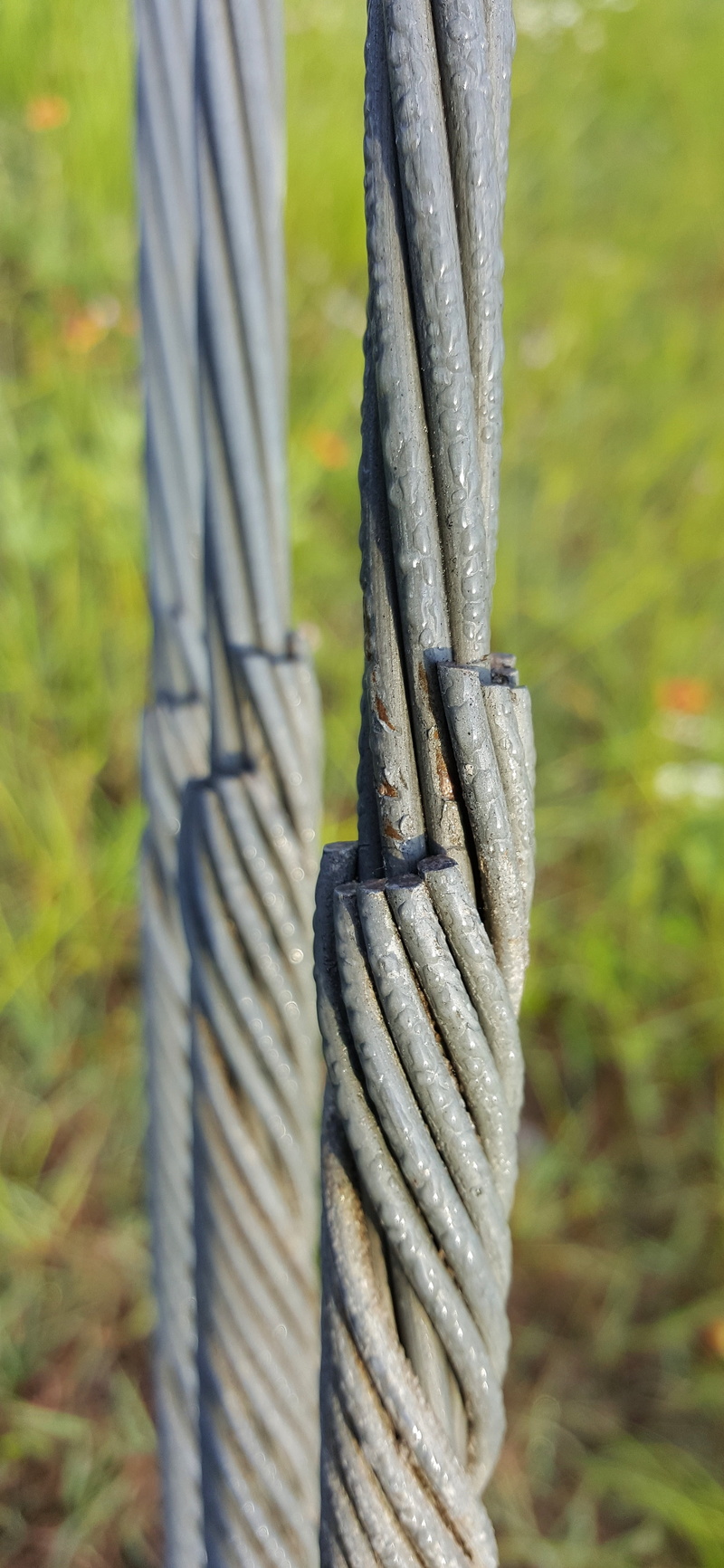 tied up, cables, metal, selective focus, day, safety, no people, wires, outdoors, fasten, sunlight, focus on foreground, nature, wooden post, connection