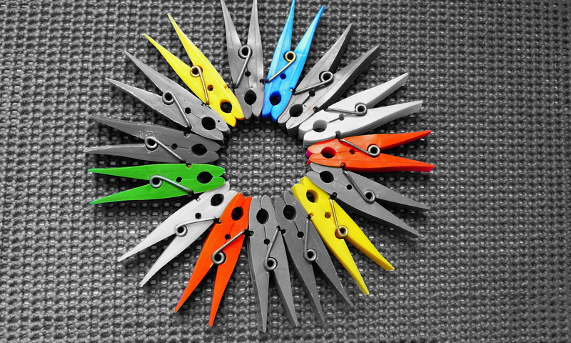 large group of objects, creativity, grey, clamp machine, red, spreading out, close-up, choice, plastic, no people, multi colored, studio shot, green color