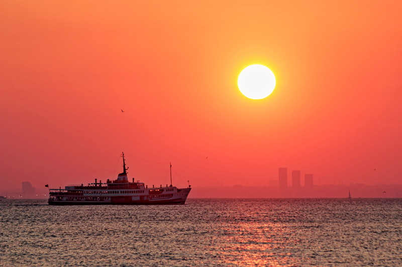 sky, urban skyline, beauty in nature, no people, steamship, orange color, water, bosphorus, nature, mode of transportation, istanbul, architecture, ship