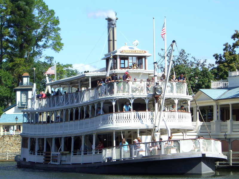 outdoors, city, architecture, sky, tree, travel destinations, built structure, nature, mode of transportation, ship, steam boat, passenger craft, nautical vessel