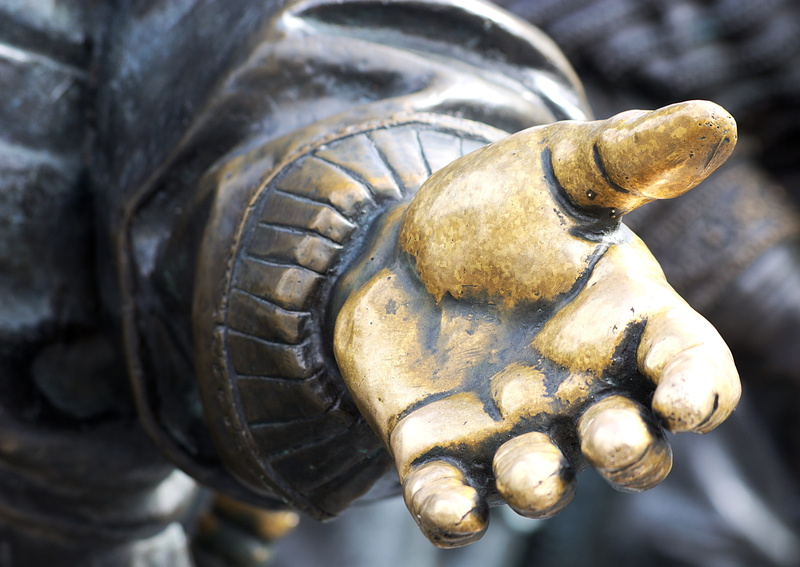 reaching out, day, fingers, history, outdoors, mode of transportation, extreme close-up, car, transportation, art and craft, land vehicle, wheel, left