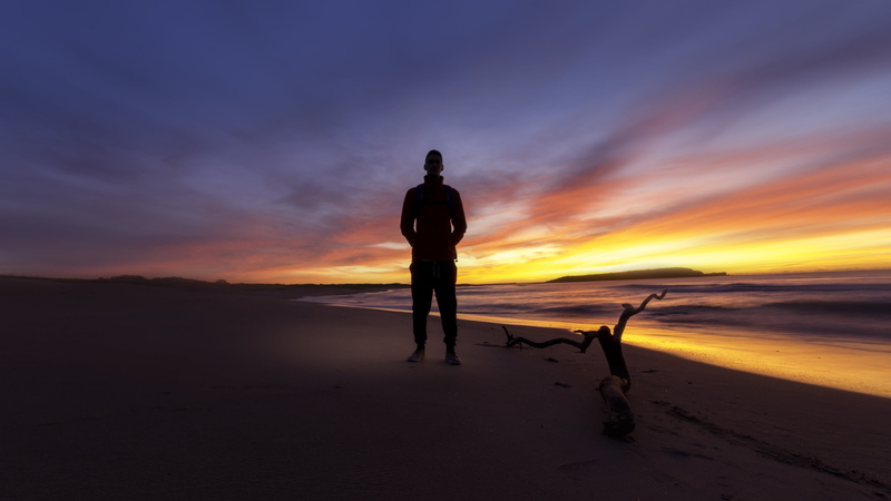 one person, rear view, person, lifestyles, 2K, sun, land, sand, sea, ocean, adults only, sky, beach, dawn, cloud - sky, silhouette, light, outdoors, tranquil scene