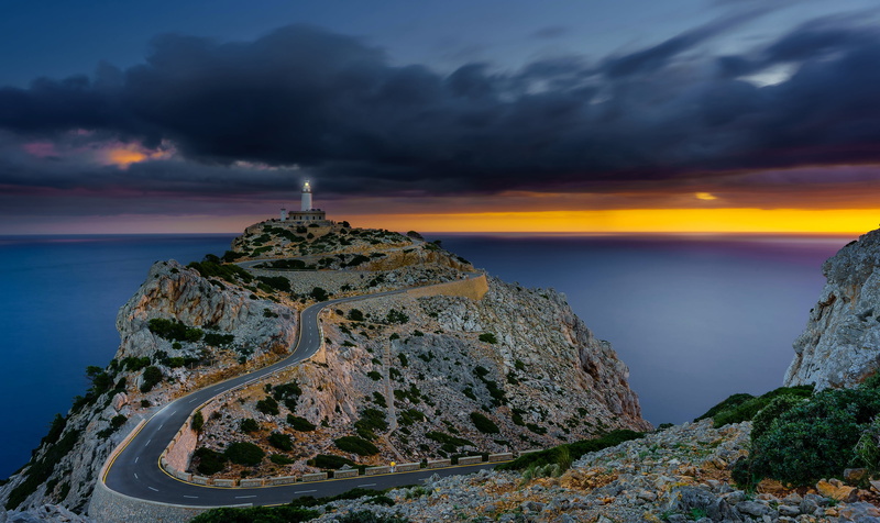 clouds, coast, Spain, Mallorca, lighthouse, stones, 2K, sea, road, rocks, dawn, the sky, horizon, Sunrise