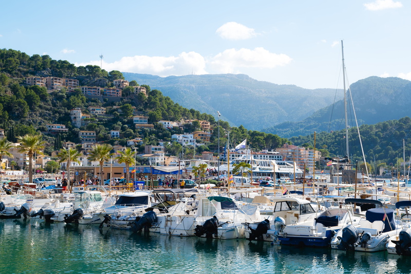 building exterior, tree, harbor, port, mountain range, green, waterfront, cloud - sky, nature, majorca, reflections, mode of transportation, port de sóller
