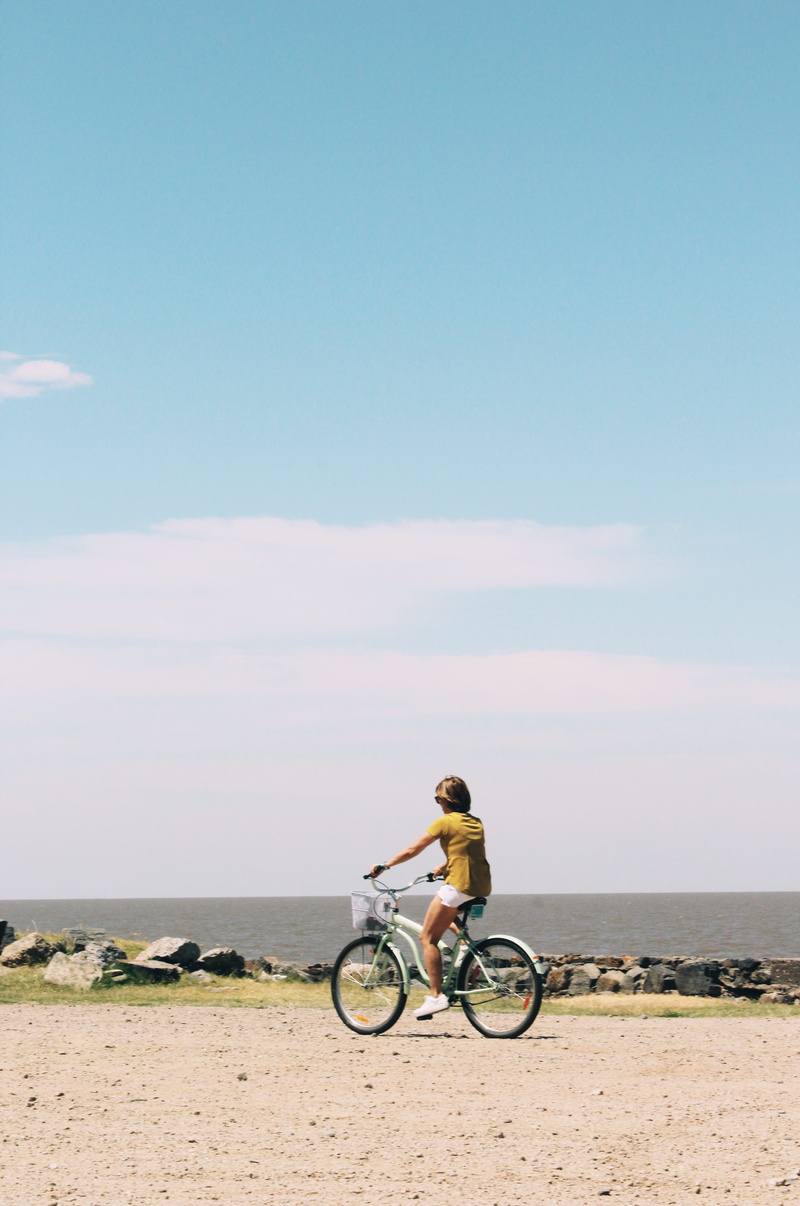 land, one person, bicycle, transportation, colonia del sacramento, lifestyles, real people, uruguay, scenics - nature, water, horizon over water, riding