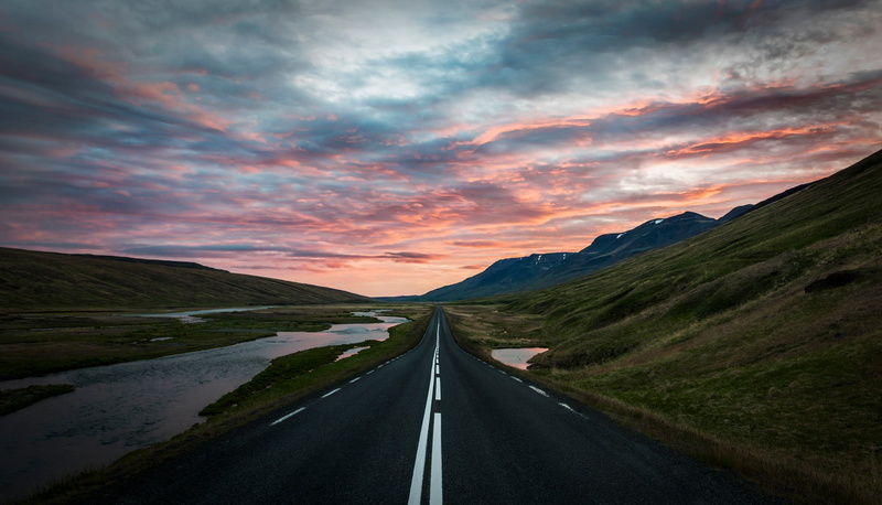 diminishing perspective, outdoors, symbol, transportation, sky, road, sign, Iceland, multiple lane highway, environment, road marking, sunset, highway