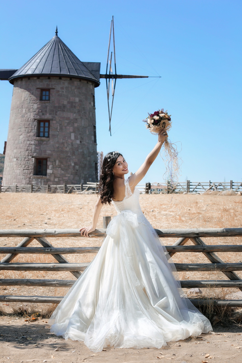 bridal, young adult, wedding, adult, sunlight, love, romantic, male, big, bouquet, real people, built structure, sky, woman, happiness, son in law, dress