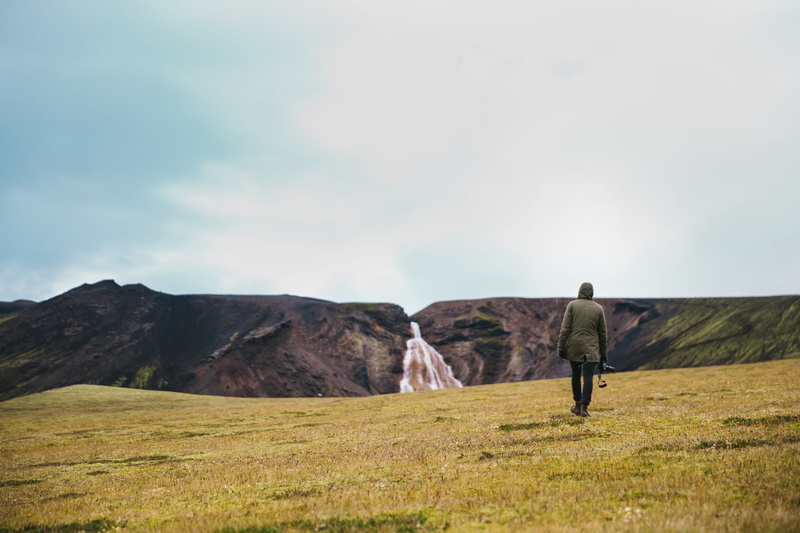 road trip, near, real people, non-urban scene, one man, one person, environmentalist, recreational pursuit, grass, water, landscape, rocks, remote, 2K