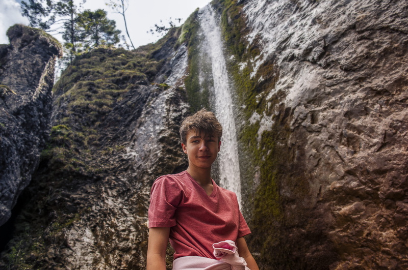 portrait, man, leisure activity, water, adventure, park, real people, waterfalls, red, nature, casual clothing, adult, red rock, rock formation, mountain