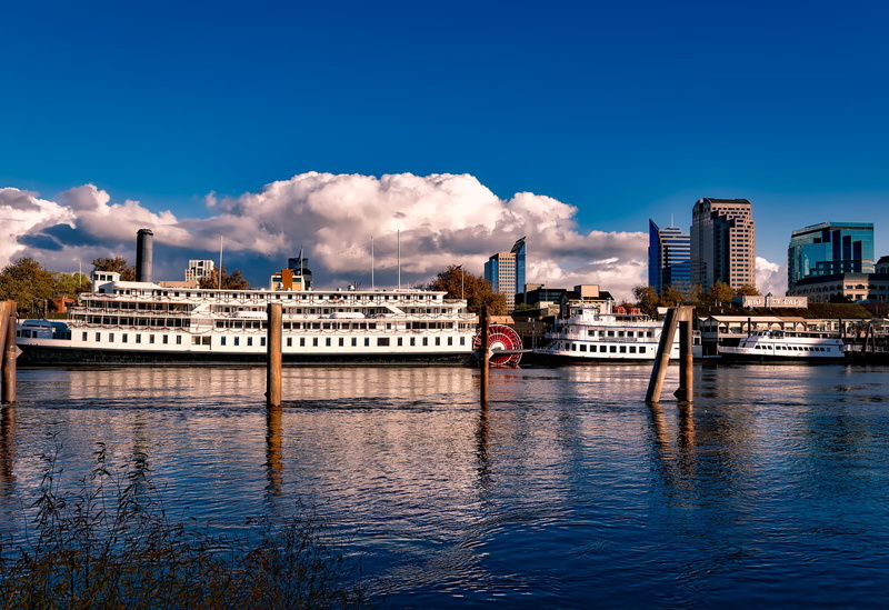 ships, outdoors, body, sacramento, hdr, skyscraper, city, ship, no people, waterfront, mode of transportation, clouds, blue, steamboat, nature, day, reflections