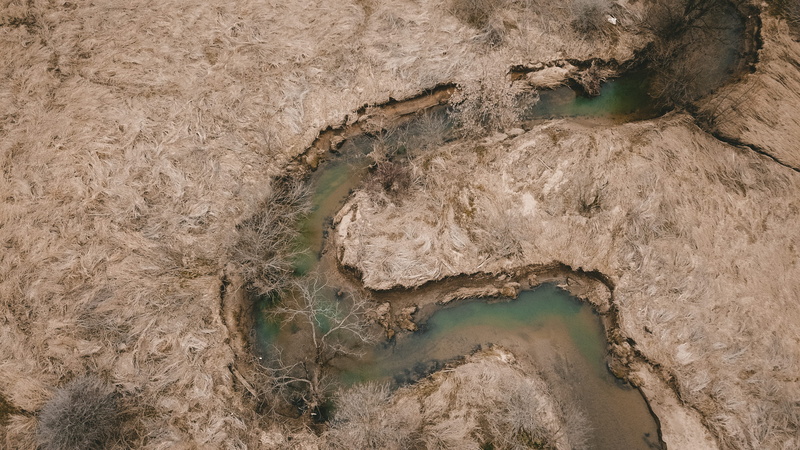 daytime, soil, high angle view, no people, land, water, stream, non-urban scene, rock formation, drone view, beauty in nature, dry, aerial view, landscape
