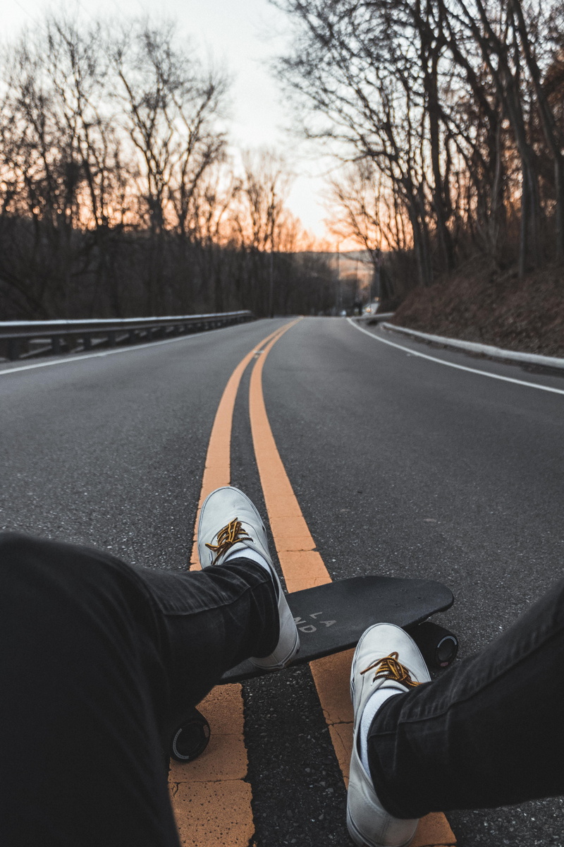 showing, road, longboard, pair, sign, men, body part, outdoors, wearing, legs, nature, daytime, low section, human leg, skateboard, 5K, real people, plant