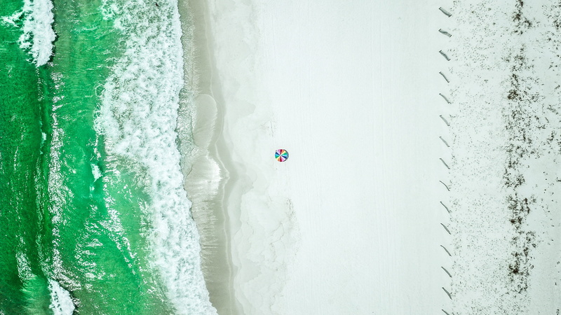 wave, dune, sport, nature, drone view, land, white sand, beauty in nature, parasol, birds eye, ocean, one person, water, aerial, shoreline, umbrella, photography