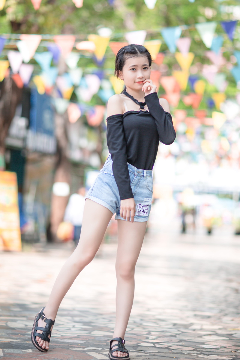 portrait, women, one person, people, beautiful woman, one woman only, street, outfit, hairstyle, focus on foreground, cuffed, female, young adult, black
