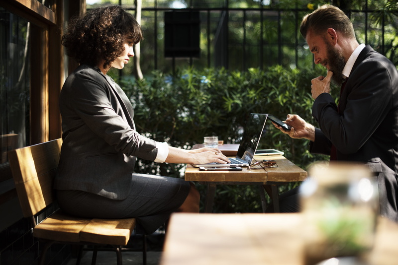 mobile phone, business person, adult, serious, laptop, table, garden, using laptop, communication, partner, black, working, corporate, Caucasian, man, computer