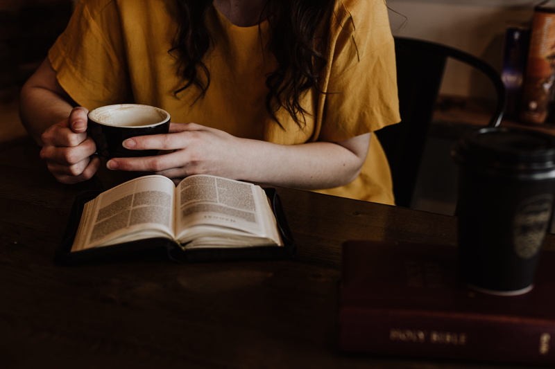 wearing, hand, hot drink, brown, indoor, cup, cafe, mug, publication, 5K, drinking, warm, coffee - drink, food and drink, sitting, women, holding, drink