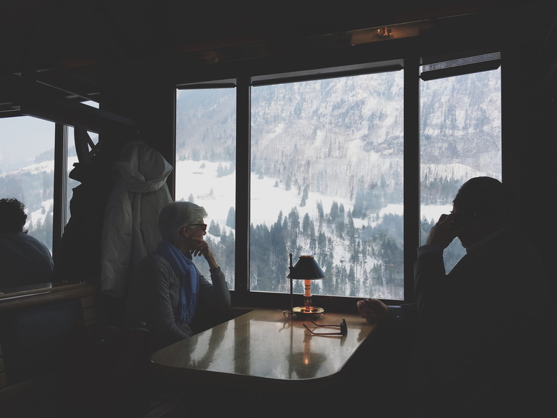 sitting, hill, rear view, mode of transportation, mountain, males, nature, lifestyles, people, day, table, glass - material, covered, snow, leisure activity