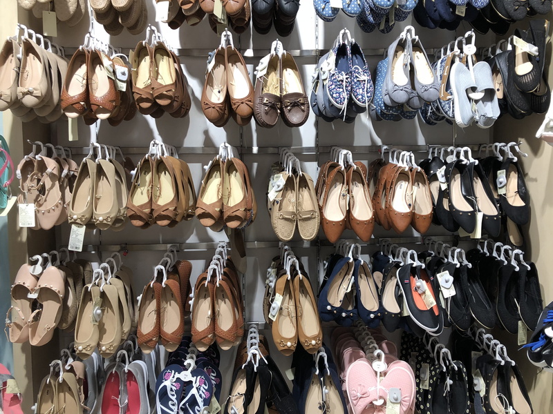 store, floaters, no people, variation, collection, for sale, market, retail display, india, slippers, indoors, choice, in a row, order, shoe, side by side