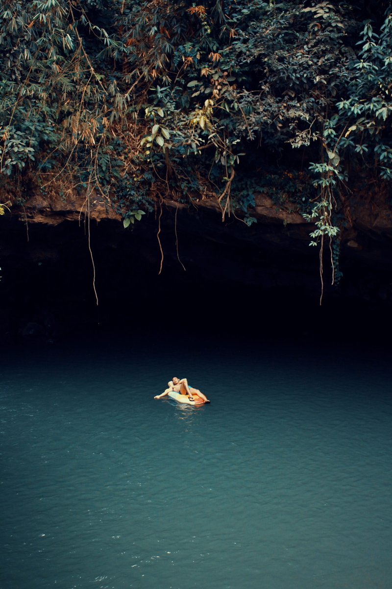 outdoors, beauty in nature, lying, plant, real people, cave, 5K, forest, body, young adult, fall, tranquil scene, transportation, woodland, nautical vessel