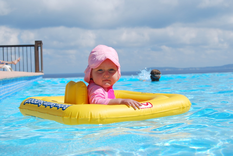 innocence, one person, daytime, girls, portrait, pool, swimming pool, floating on water, smiling, inflatable, yellow, 4K, cloud - sky, looking at camera