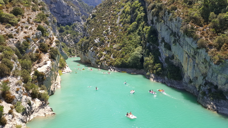 plant, rock, real people, turquoise colored, beauty in nature, formation, rock - object, solid, riding, sea, cliff, swimmer, daytime, lifestyles, scenics - nature