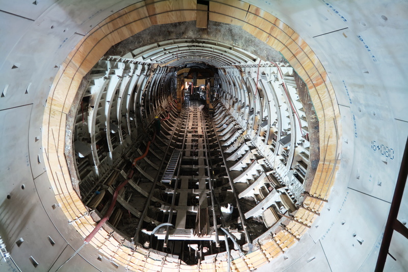 architecture, tunnel, excavation, group of people, high angle view, walking, built structure, day, incidental people, indoors, people, adult, real people